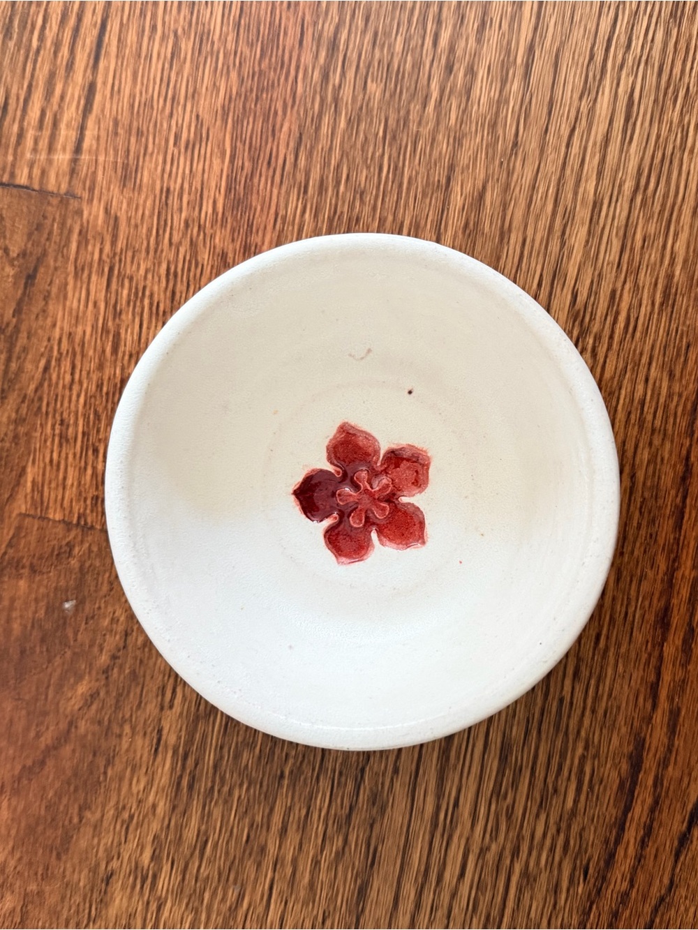 Handcrafted Pottery Trinket Dish with Red Floral Accent